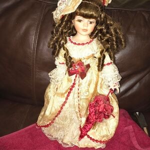 Elegant Porcelain Doll with Lace Dress and Parasol